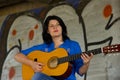 Woman playing the guitar Royalty Free Stock Photo