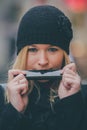 Woman playing harmonica Royalty Free Stock Photo