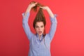 Woman playing with her long silky hair Royalty Free Stock Photo