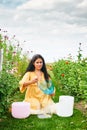 Woman playing music on crystal singing bowls