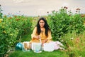 Woman playing music on crystal singing bowls