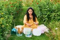 Woman playing music on crystal singing bowls