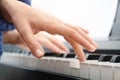 Woman playing piano, closeup. Music lesson Royalty Free Stock Photo