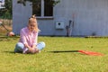 Woman playing pinscher ratter dog outside