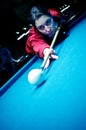 Woman playing pool