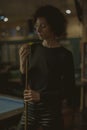 Woman playing pool at a bar Royalty Free Stock Photo