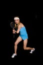 Woman playing raquet ball Royalty Free Stock Photo