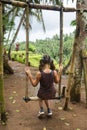 Woman playing swing bamboo traditional playing ground in Thailand. Royalty Free Stock Photo