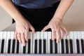 Woman playing synthesizer, women hands on piano keys Royalty Free Stock Photo