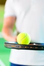 Woman playing tennis in fitness club Royalty Free Stock Photo