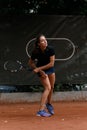 woman playing tennis and waiting tennis ball. Outdoor tennis practice. Royalty Free Stock Photo