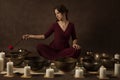 Woman playing Tibetan bowls