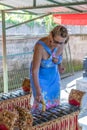 Woman playing on Traditional Balinese music instrument gamelan. Bali island, Indonesia. Royalty Free Stock Photo