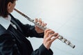 Woman playing transverse flute