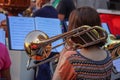 Woman playing the trombone. Royalty Free Stock Photo