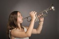 Woman playing a trumpet