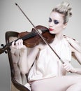 Woman playing violin Royalty Free Stock Photo