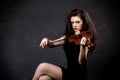 Woman playing violin Royalty Free Stock Photo