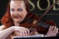 Woman playing the violin at the Vienna Ball Royalty Free Stock Photo