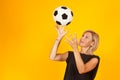 Woman playing with a soccer ball Royalty Free Stock Photo