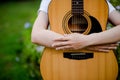 woman plays the guitar happily. Cute, bright, happy to play music that loves music concepts