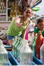 Woman Plays Ring Toss Game At County Fair Royalty Free Stock Photo