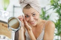 woman plucking eyebrows depilating Royalty Free Stock Photo