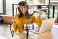 Pretty woman podcast creator making video podcast in studio Royalty Free Stock Photo