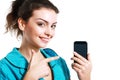 Woman point to cell phone Royalty Free Stock Photo