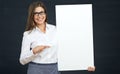 Woman pointing finger on blank board. Royalty Free Stock Photo