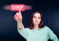 Woman pointing finger to virtual button Royalty Free Stock Photo