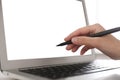 Woman pointing at modern laptop with blank screen Royalty Free Stock Photo