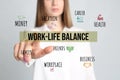 Woman pointing on phrase Work-life balance against background, closeup Royalty Free Stock Photo