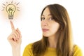 Woman pointing to illustration of light bulb. Idea concept Royalty Free Stock Photo