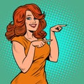 The woman points with her finger. A presentation gesture. Beautiful girl Royalty Free Stock Photo