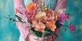 A woman poised hands present a stunning bouquet of orchids