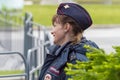 Woman police officer smiling. View from the front