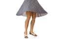 Woman in polka-dot dress standing in shoes