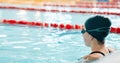 Woman, pool and swimming in water at start for sports fitness, race or training and practice. Active female person Royalty Free Stock Photo