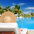 Woman at poolside with cosmopolitan cocktail Royalty Free Stock Photo