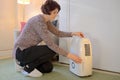 Portable dehumidifier colect water from air