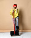Woman with portable shovel spade concept studio shot