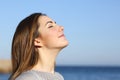 Woman portrait breathing deep fresh air