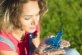 Woman portrait is with a Christmas butterfly.