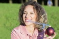 Woman portrait with a Christmas toy. Royalty Free Stock Photo