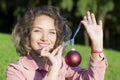 Woman portrait with a Christmas toy. Royalty Free Stock Photo