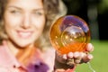 Woman portrait with a Christmas toy. Royalty Free Stock Photo