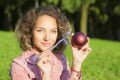 Woman portrait with a Christmas toy. Royalty Free Stock Photo