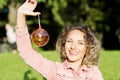 Woman portrait with a Christmas toy. Royalty Free Stock Photo