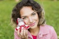 Woman portrait with a Christmas toy. Royalty Free Stock Photo